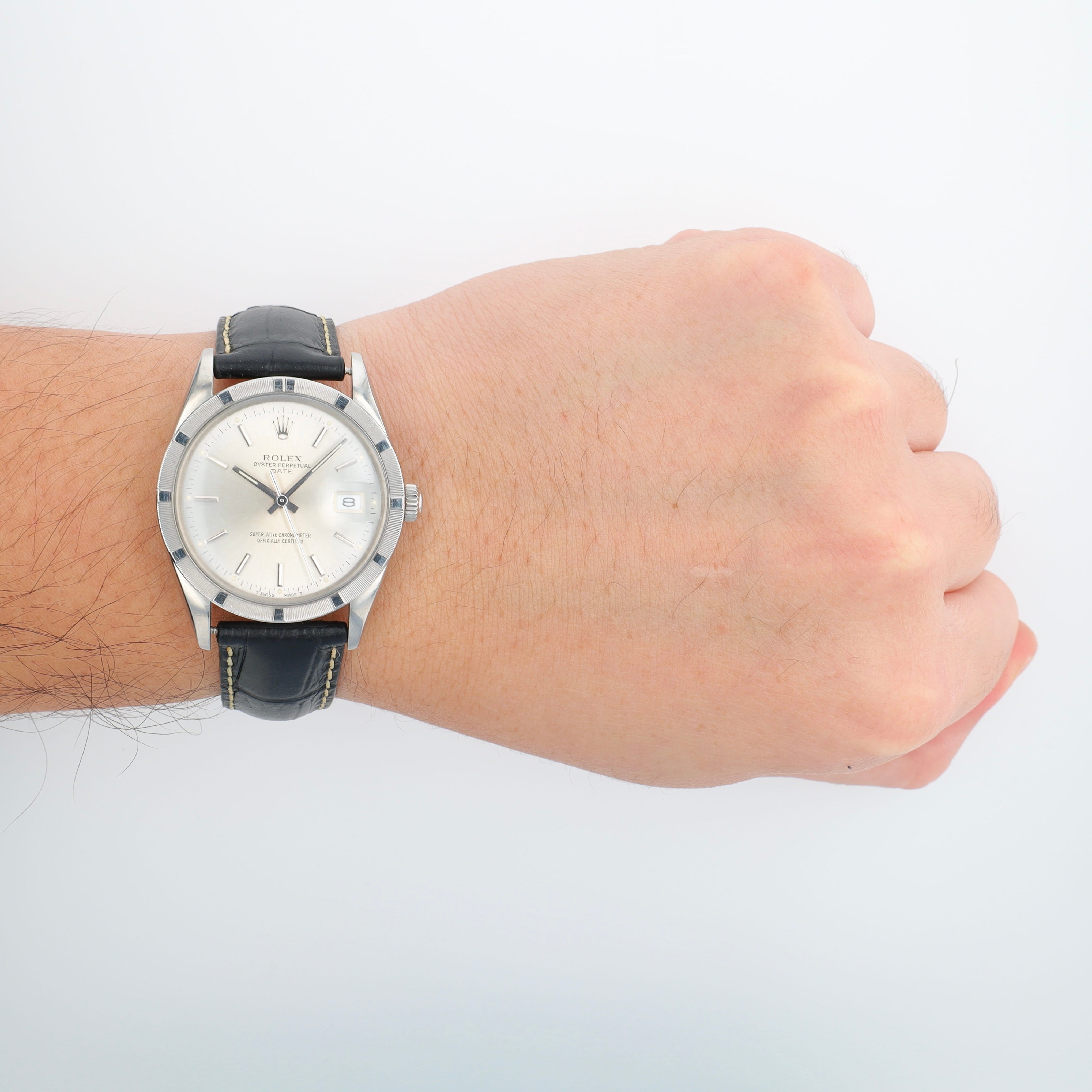 Rolex Date 15010 34mm Silver Index Dial Engine-Turned Bezel No Band Band - Luxuriant Concierge
