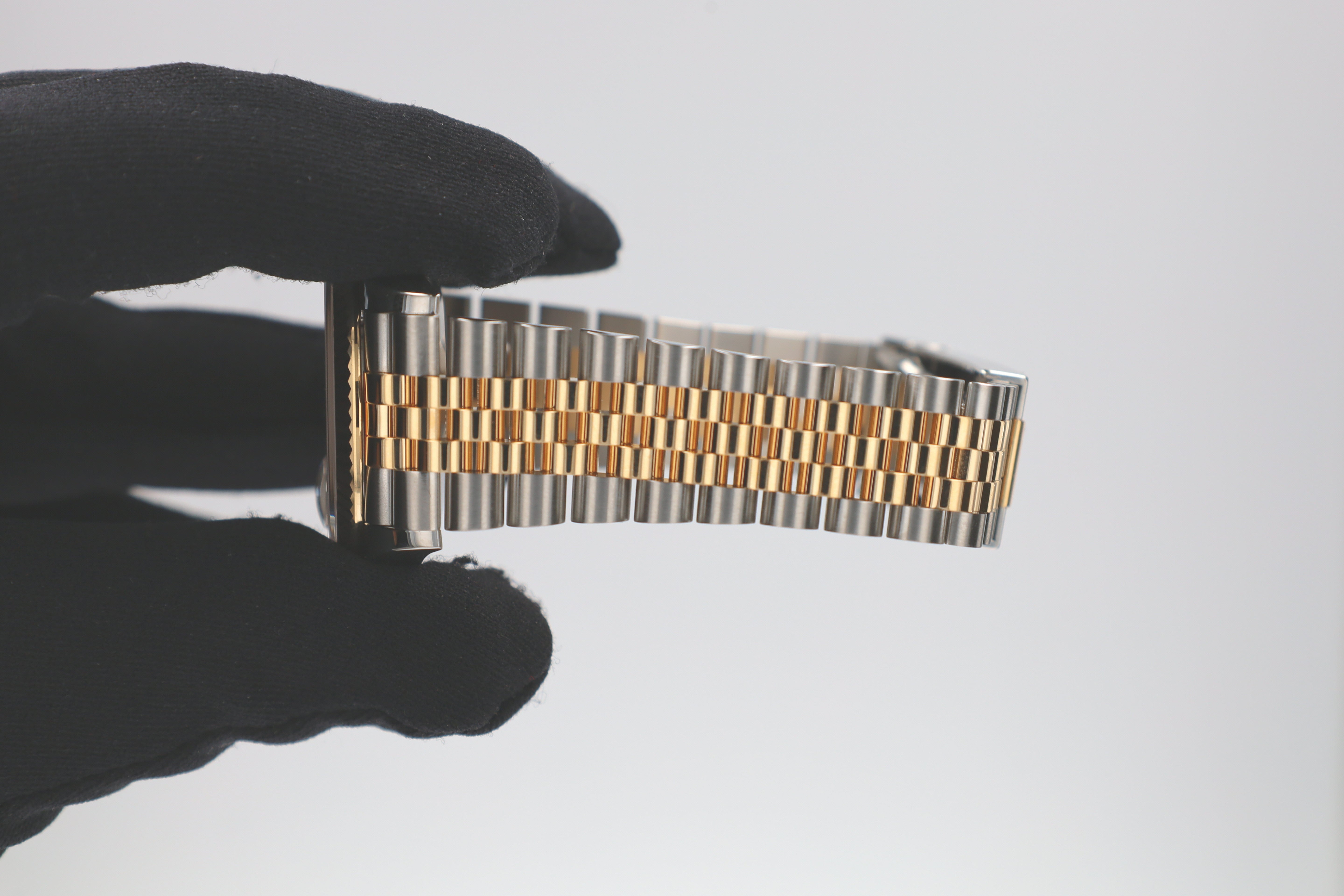 Rolex Datejust 126233 36mm Champagne Motif Index Luminous Dial Fluted Bezel Jubilee Band - Luxuriant Concierge