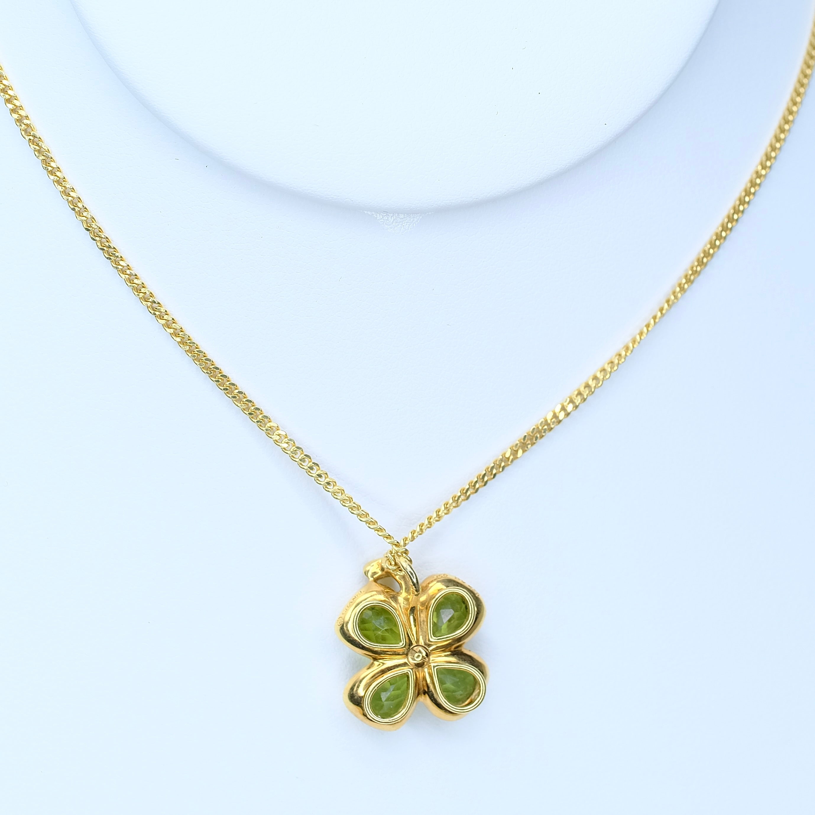 CHANEL 18K YELLOW GOLD PERIDOT CLOVER PENDANT CUBAN CHAIN - Luxuriant Concierge