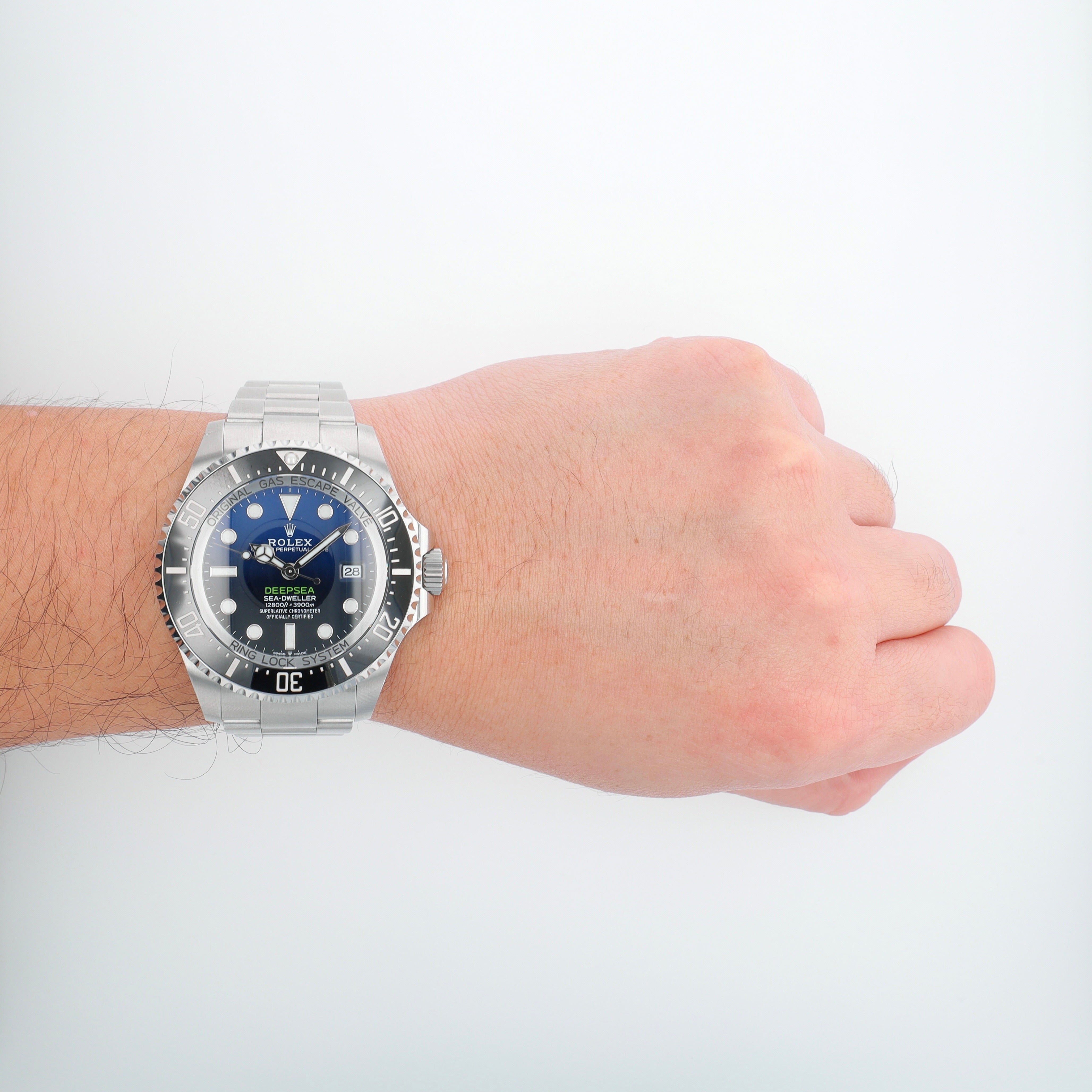 B&P Rolex Sea-Dweller 136660 44mm Blue-Black Luminous Dial Rotating Bezel with Black Insert Bezel Oyster Band - Luxuriant Concierge