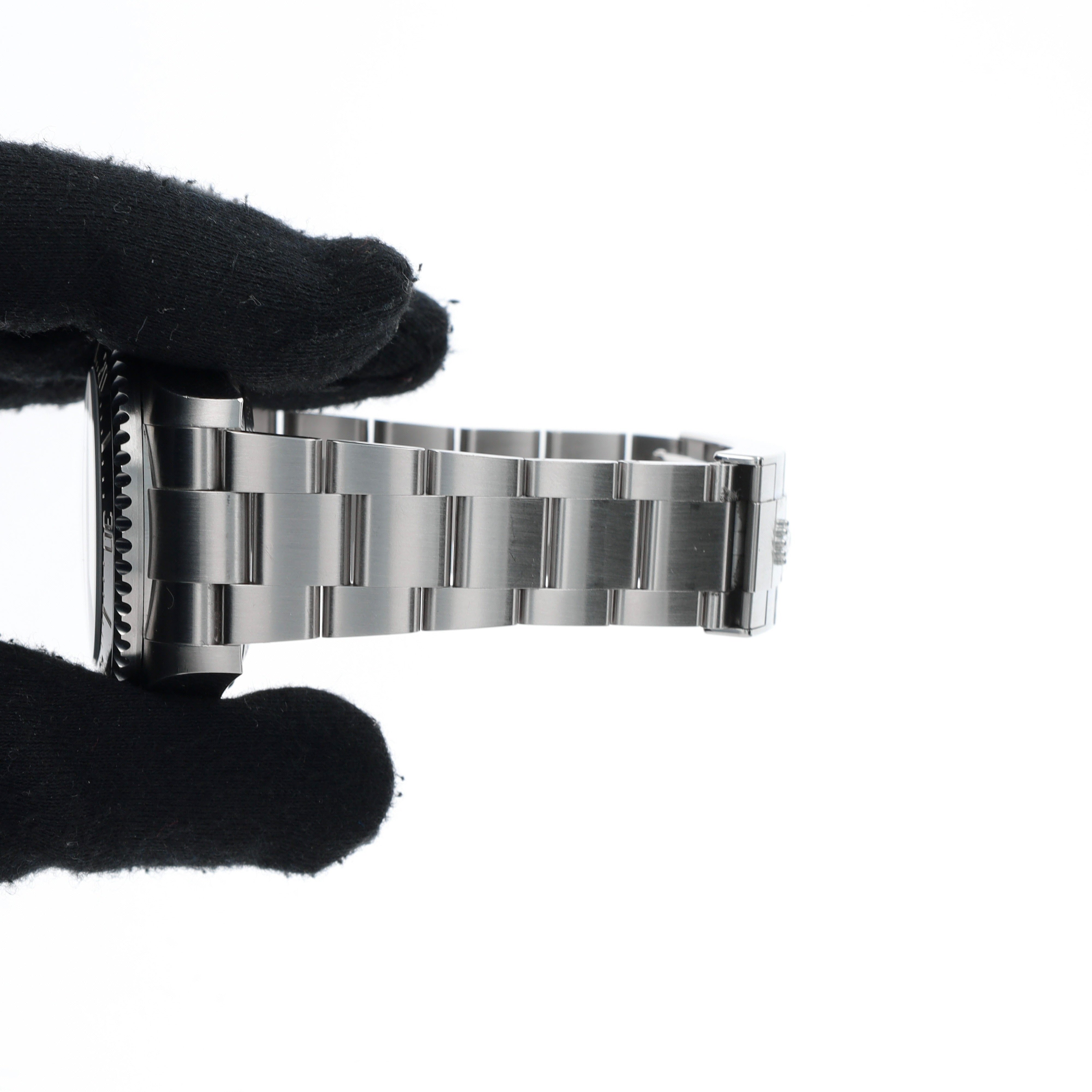 B&P Rolex Sea-Dweller 136660 44mm Blue-Black Luminous Dial Rotating Bezel with Black Insert Bezel Oyster Band - Luxuriant Concierge