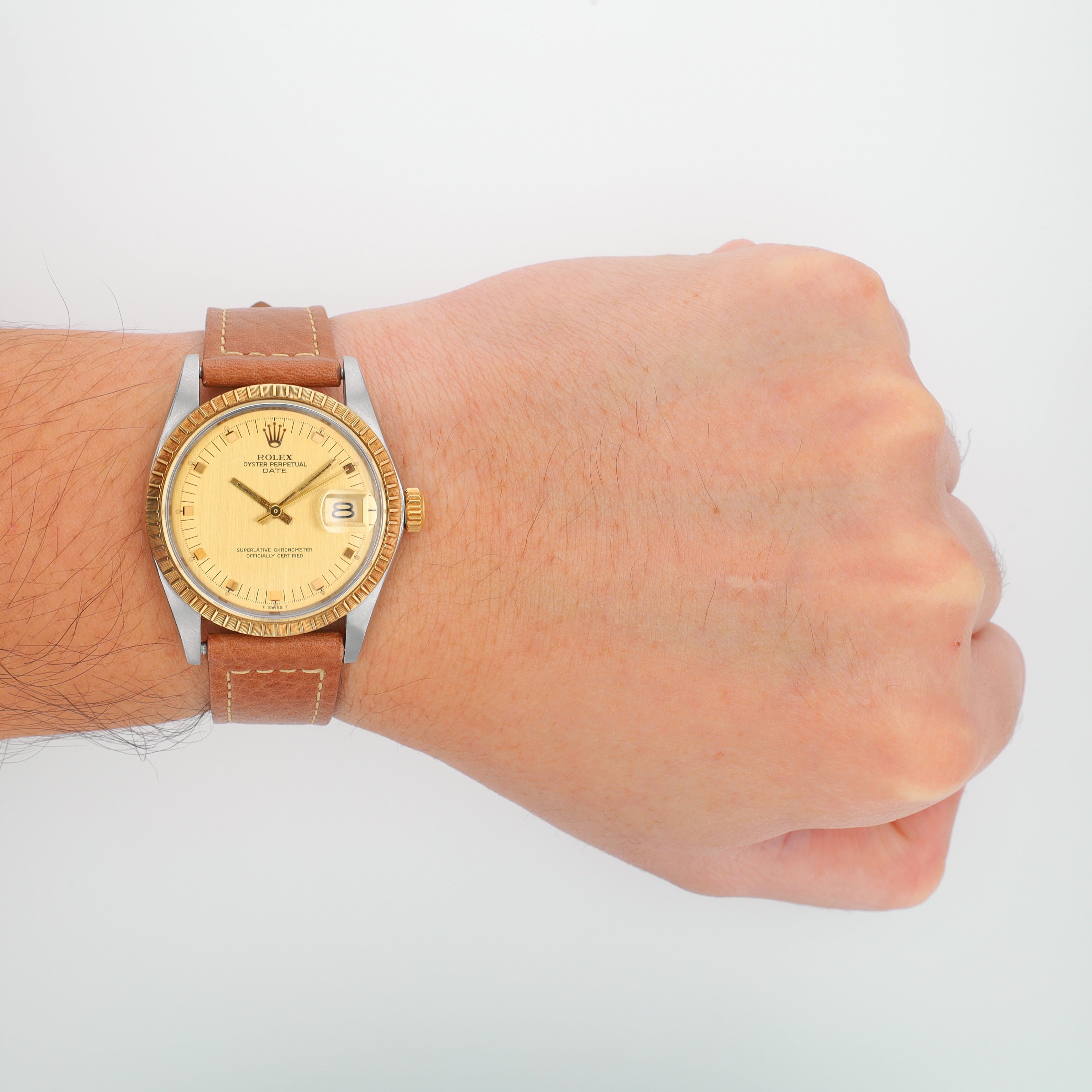 Rolex Date 1505 34mm Champagne Diamond Marker Dial Engine-Turned Bezel - Luxuriant Concierge