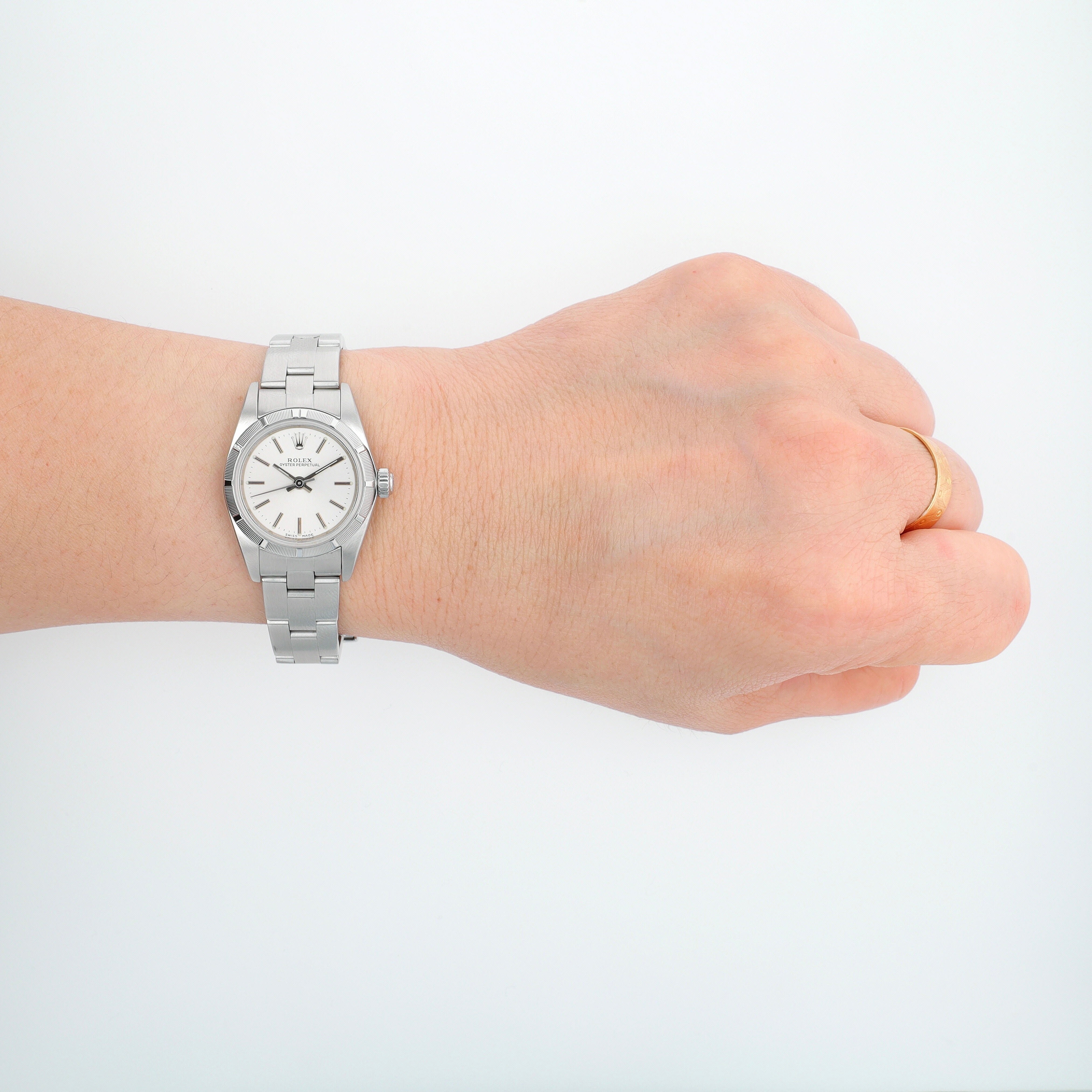 Rolex Oyster Perpetual 76030 26mm Silver Index Dial Engine Turned Bezel Oyster Band