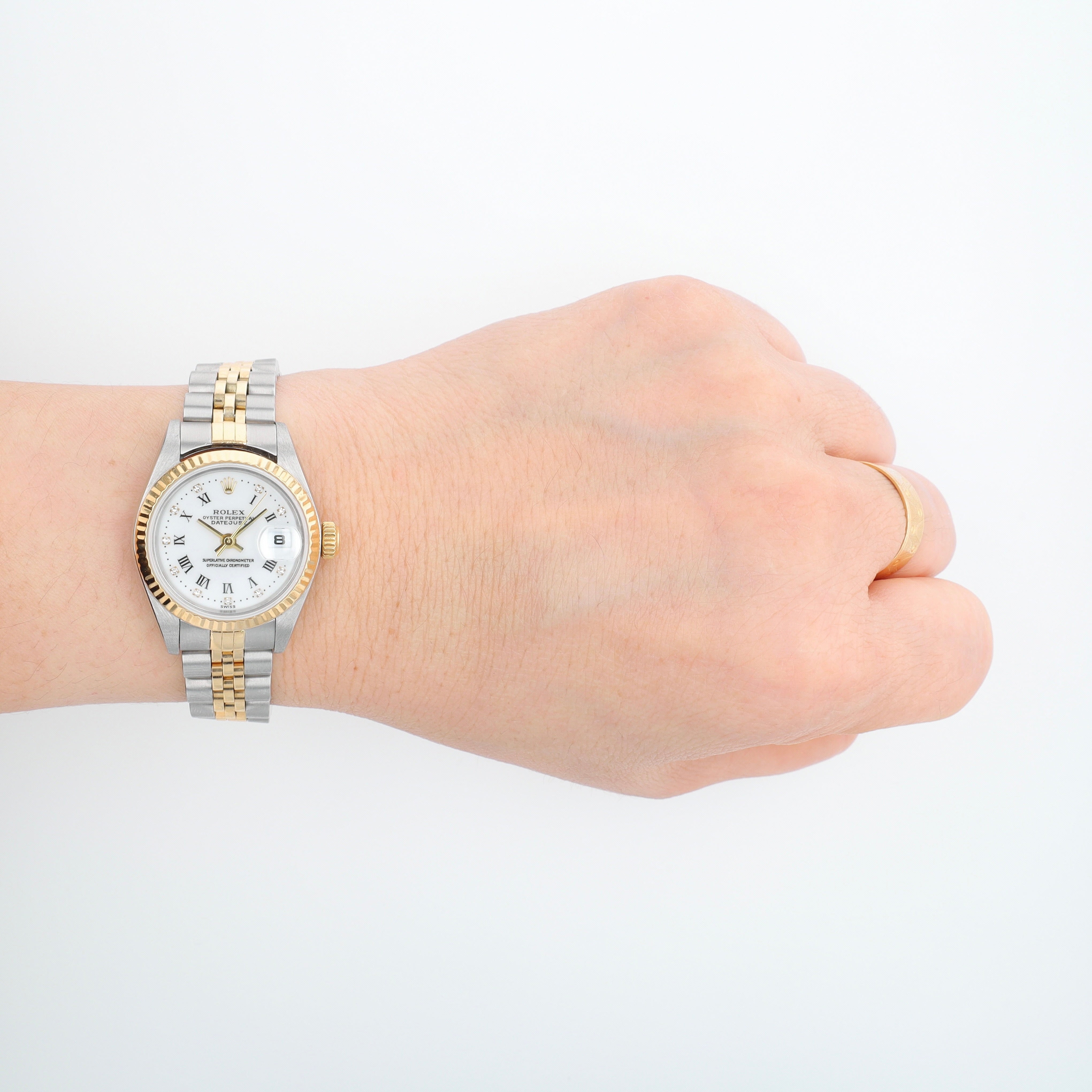 Rolex Datejust 79173 26mm White Roman & Diamond Dial Fluted Bezel Jubilee Band - Luxuriant Concierge