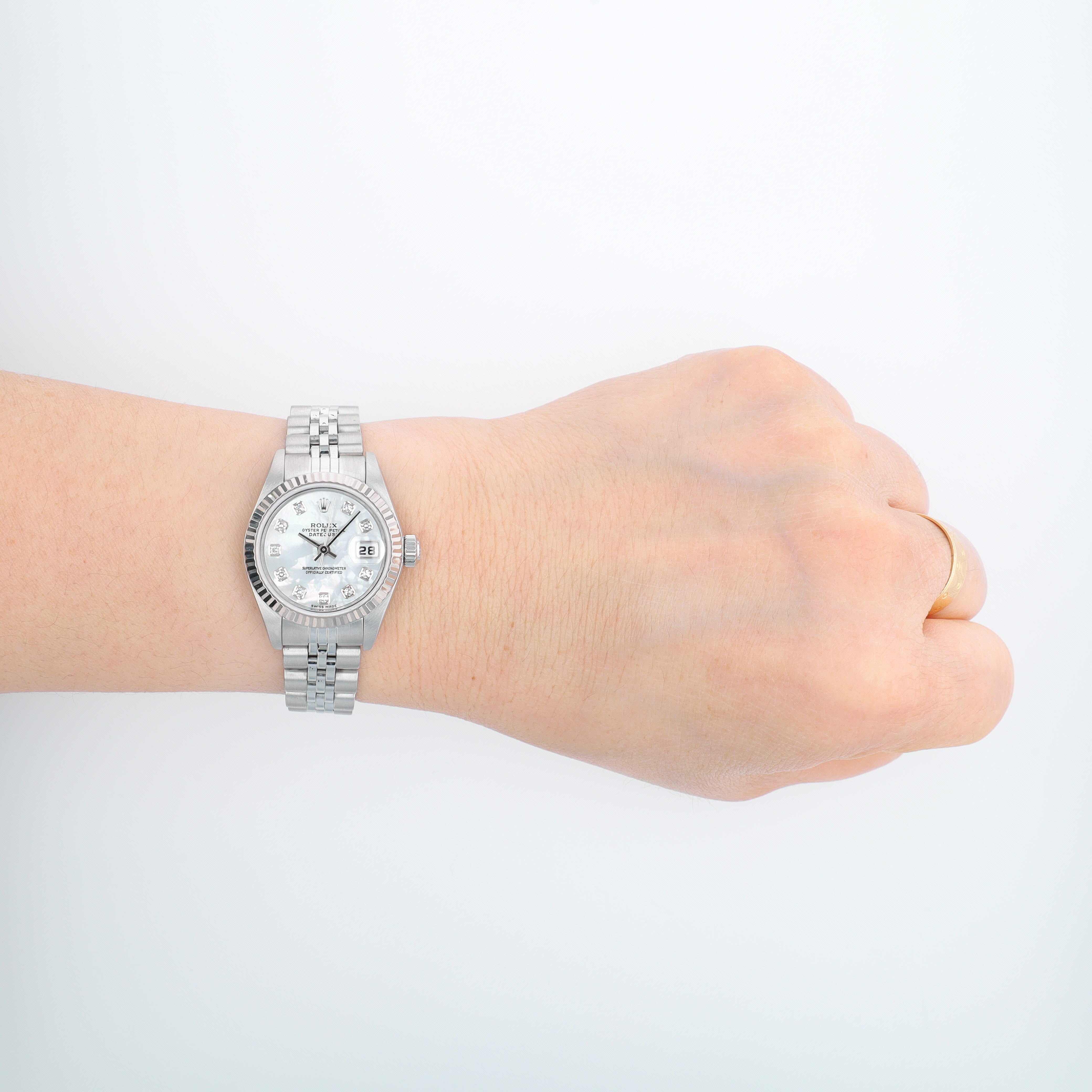 Rolex Datejust 79174 26mm White Mother of Pearl Diamond Dial Fluted Bezel Jubilee Band - Luxuriant Concierge