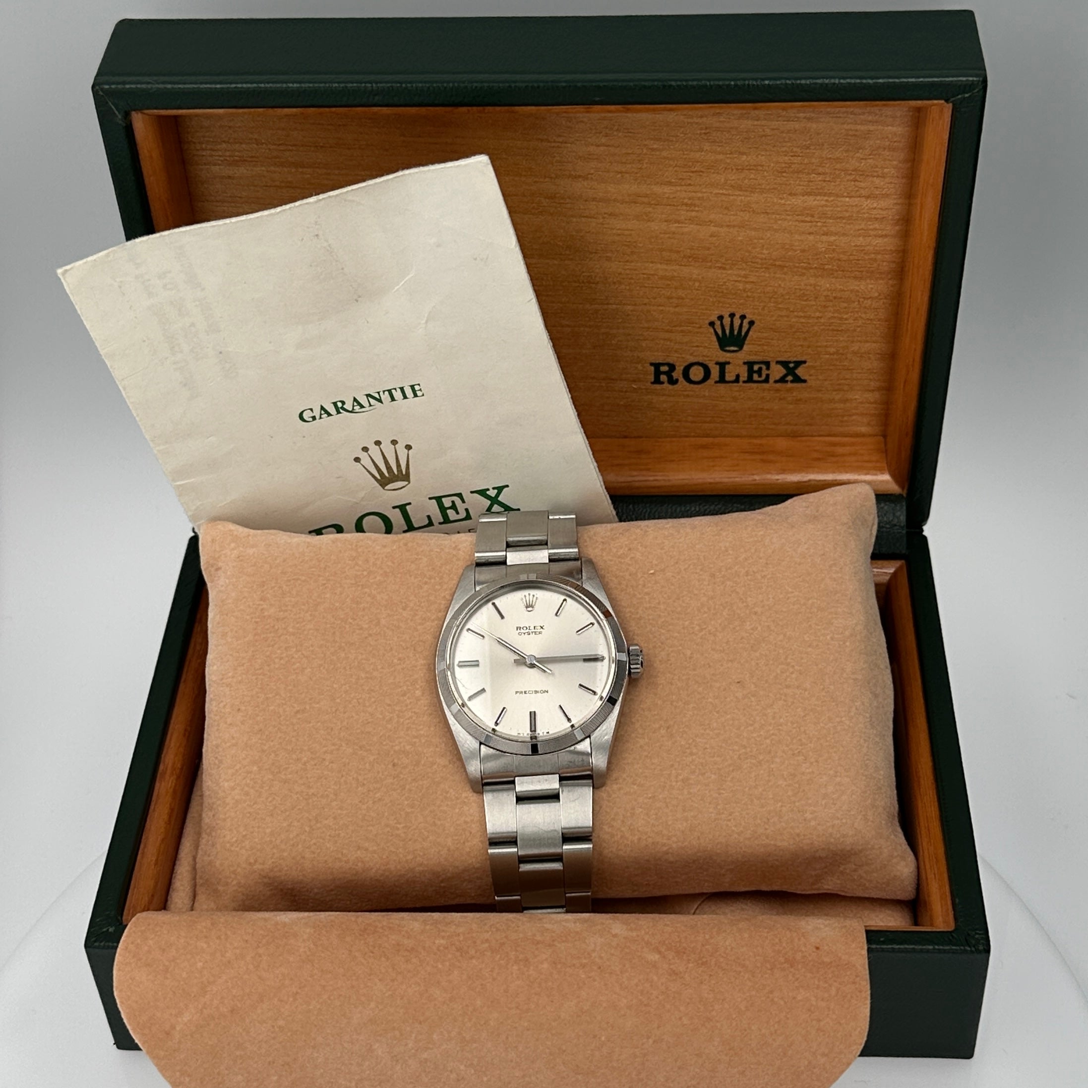 B&P Rolex Oyster (Manual Wind) 6427 34mm Silver Index Dial Smooth Bezel Oyster Band - Luxuriant Concierge