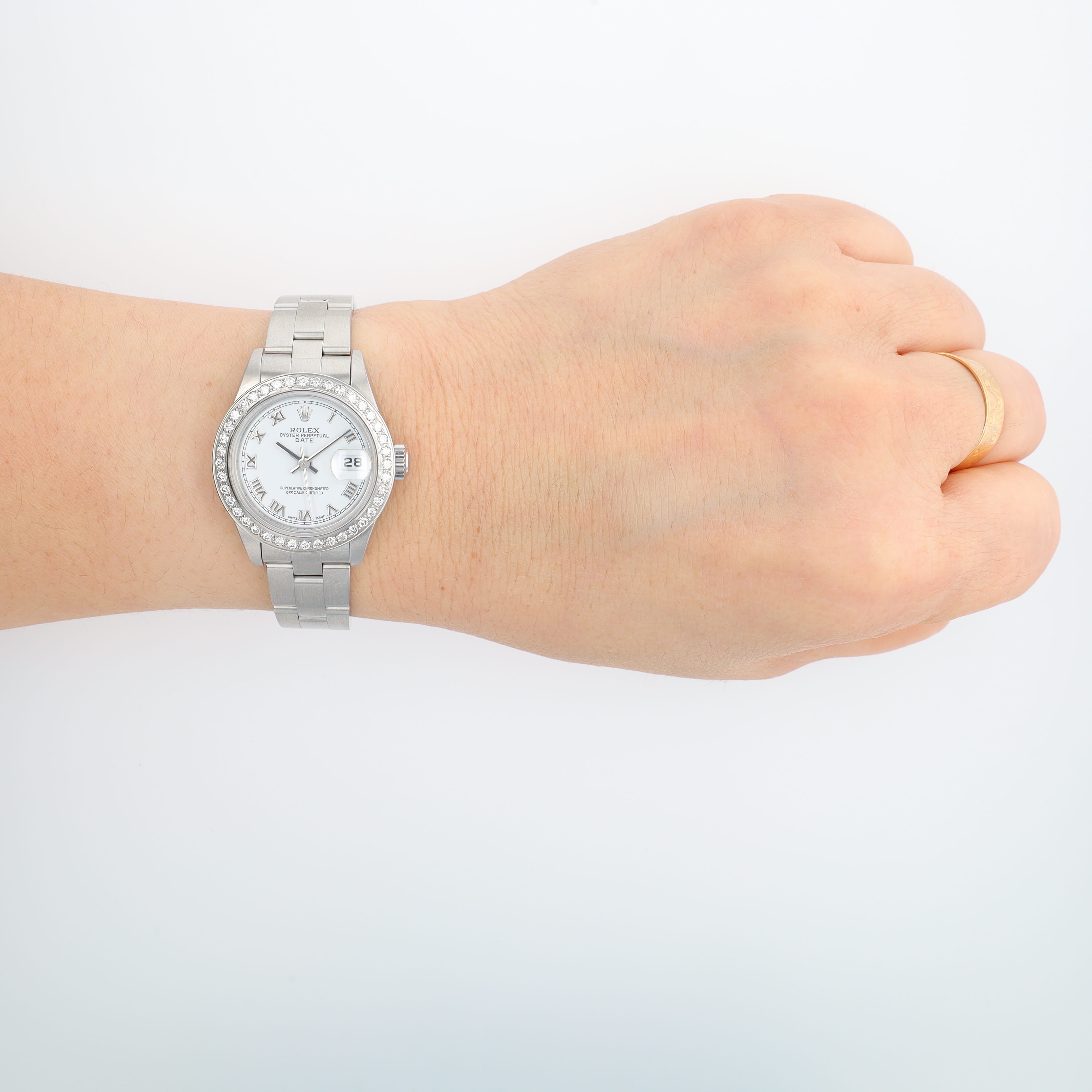 Rolex Datejust 79160 26mm White Roman Numeral Dial Diamond - Pave Bezel Oyster Band - Luxuriant Concierge