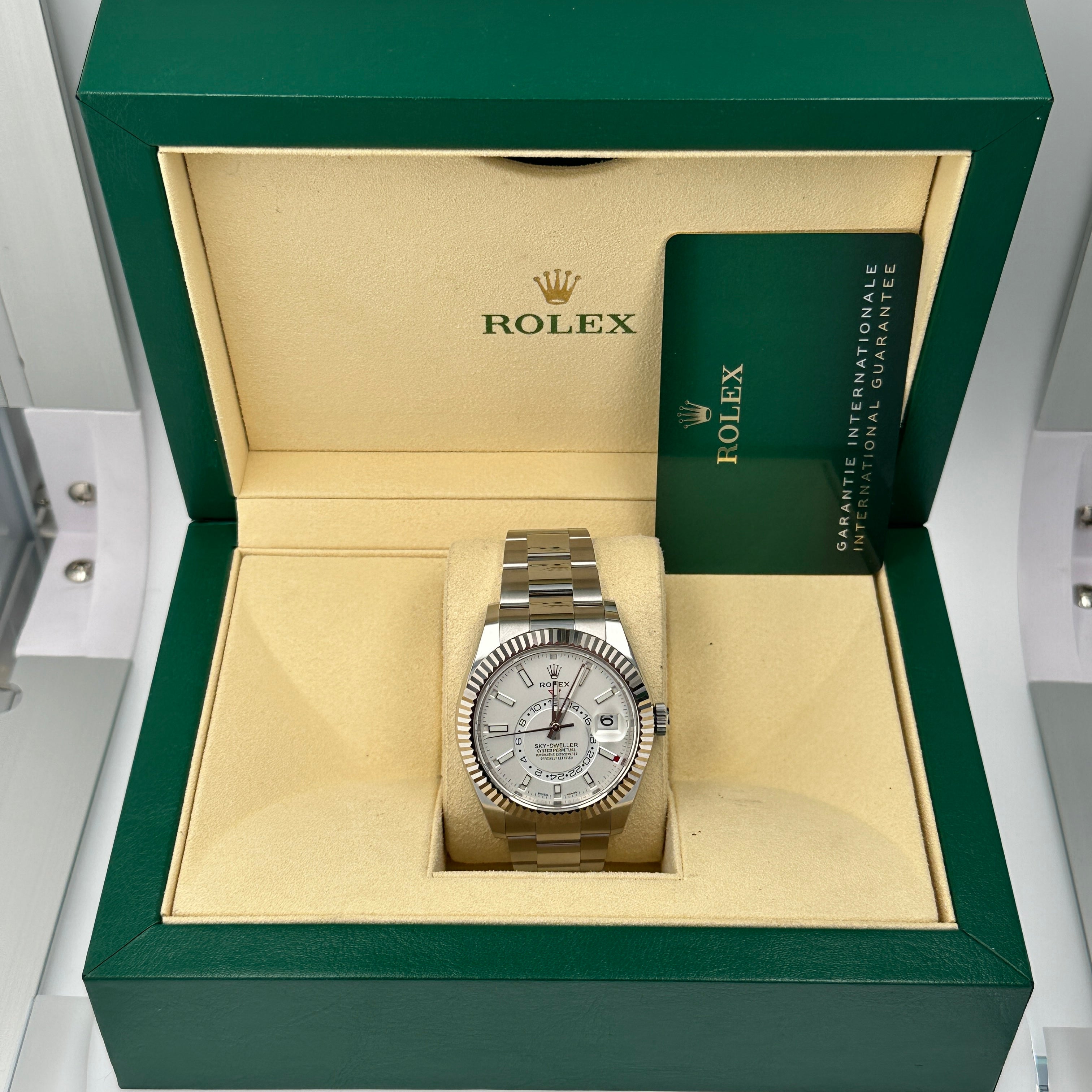B&P Rolex Sky-Dweller 326934 42mm White Luminous Dial Fluted Bezel Oyster Band - Luxuriant Concierge