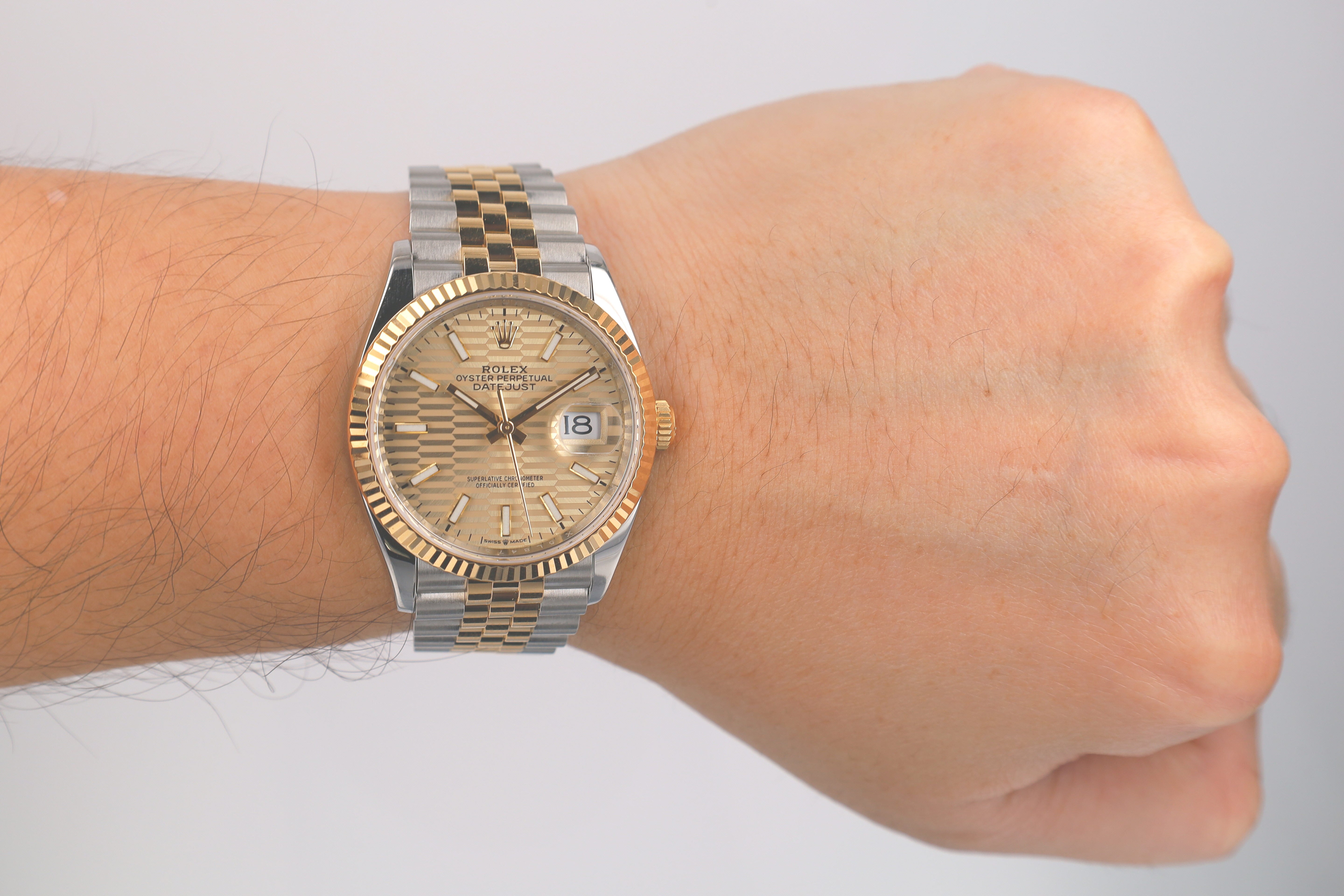 Rolex Datejust 126233 36mm Champagne Motif Index Luminous Dial Fluted Bezel Jubilee Band - Luxuriant Concierge