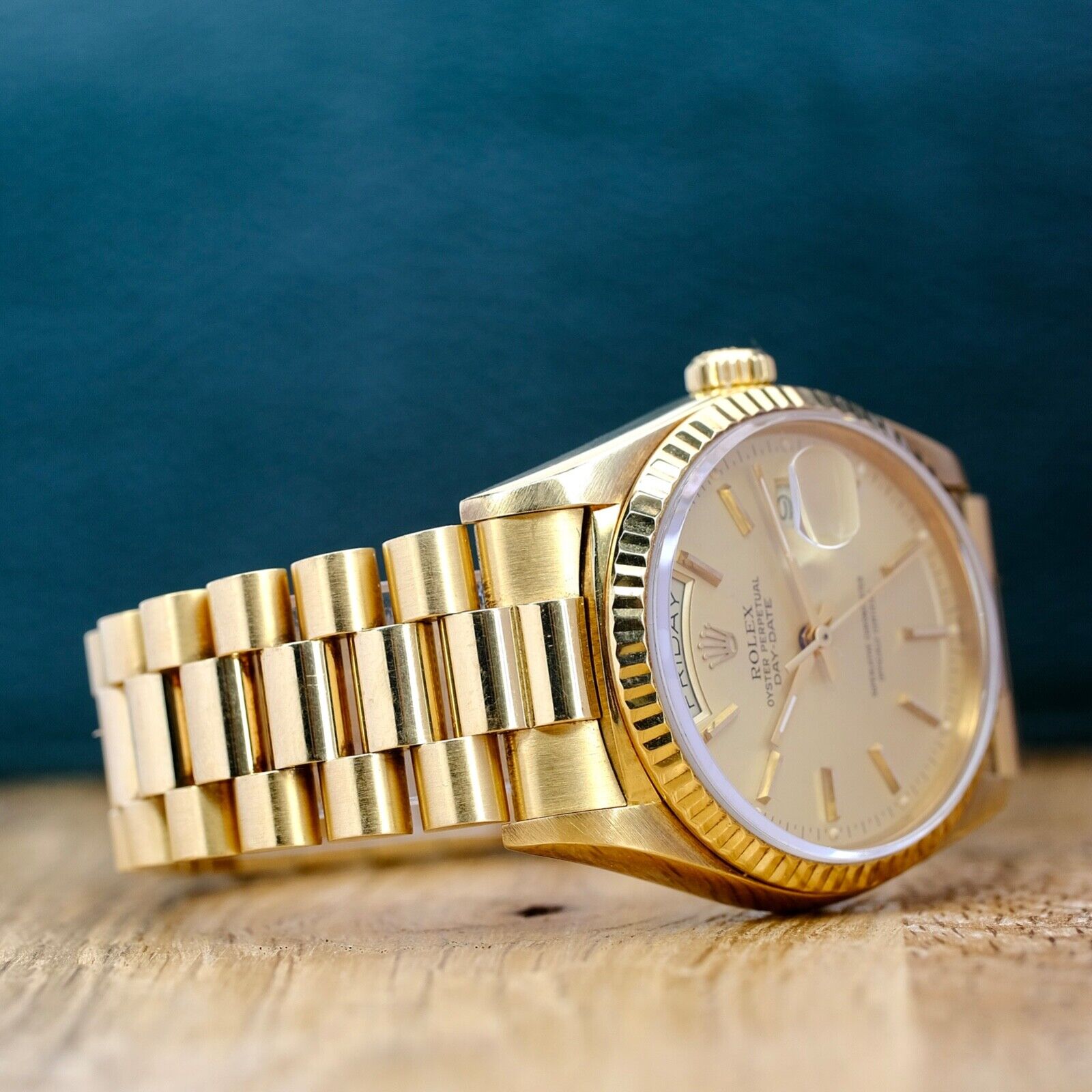 ROLEX DAY-DATE CHAMPAGNE INDEX PRESIDENT BAND WATCH 18038 - Luxuriant Concierge