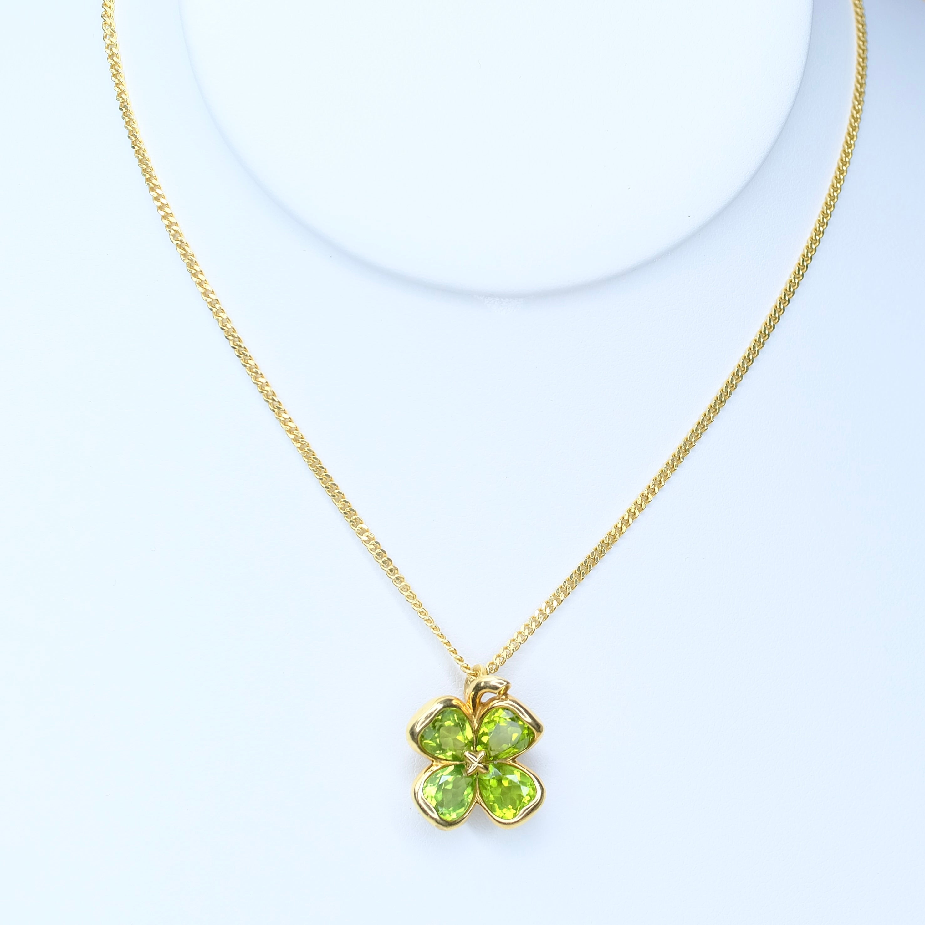 CHANEL 18K YELLOW GOLD PERIDOT CLOVER PENDANT CUBAN CHAIN - Luxuriant Concierge