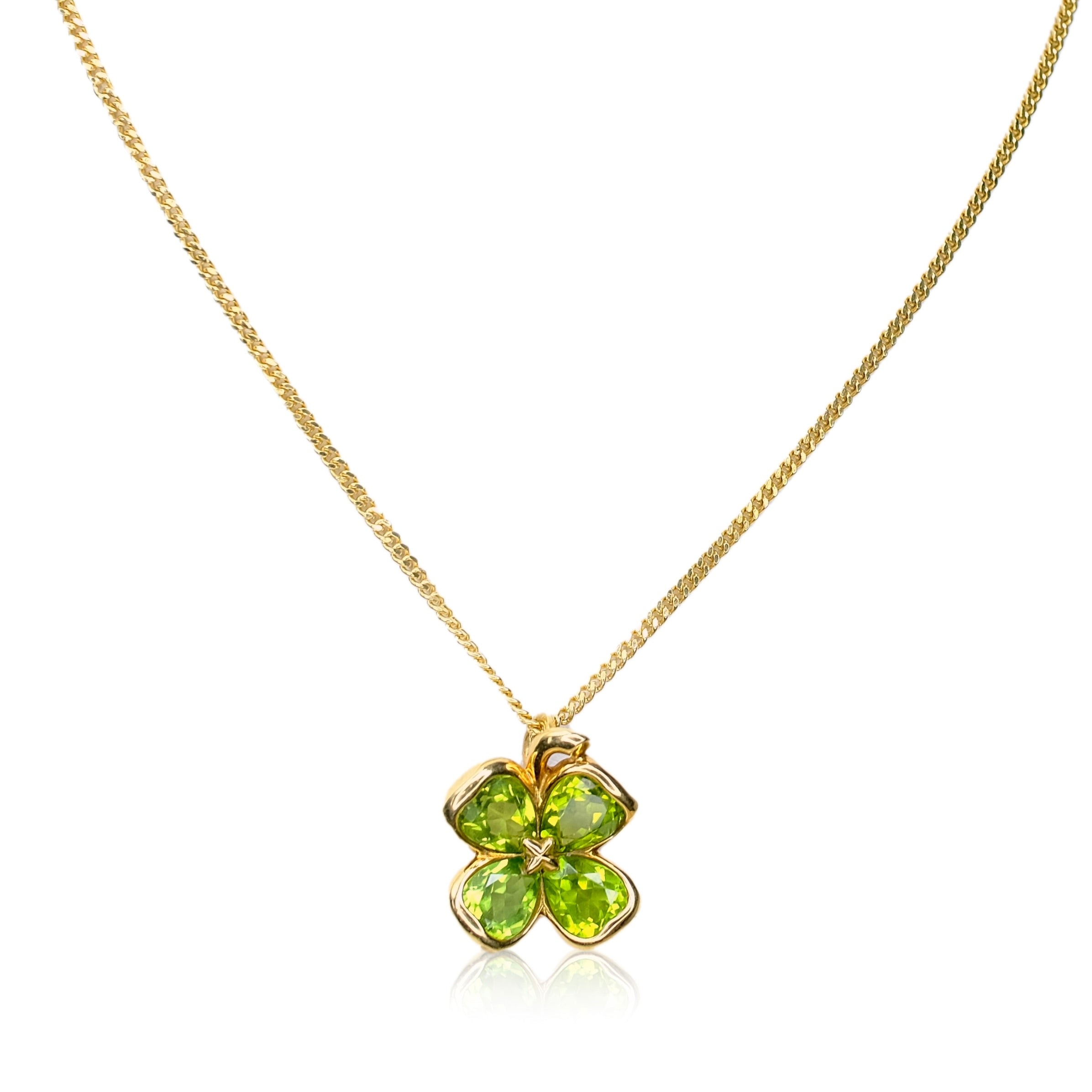 CHANEL 18K YELLOW GOLD PERIDOT CLOVER PENDANT CUBAN CHAIN - Luxuriant Concierge