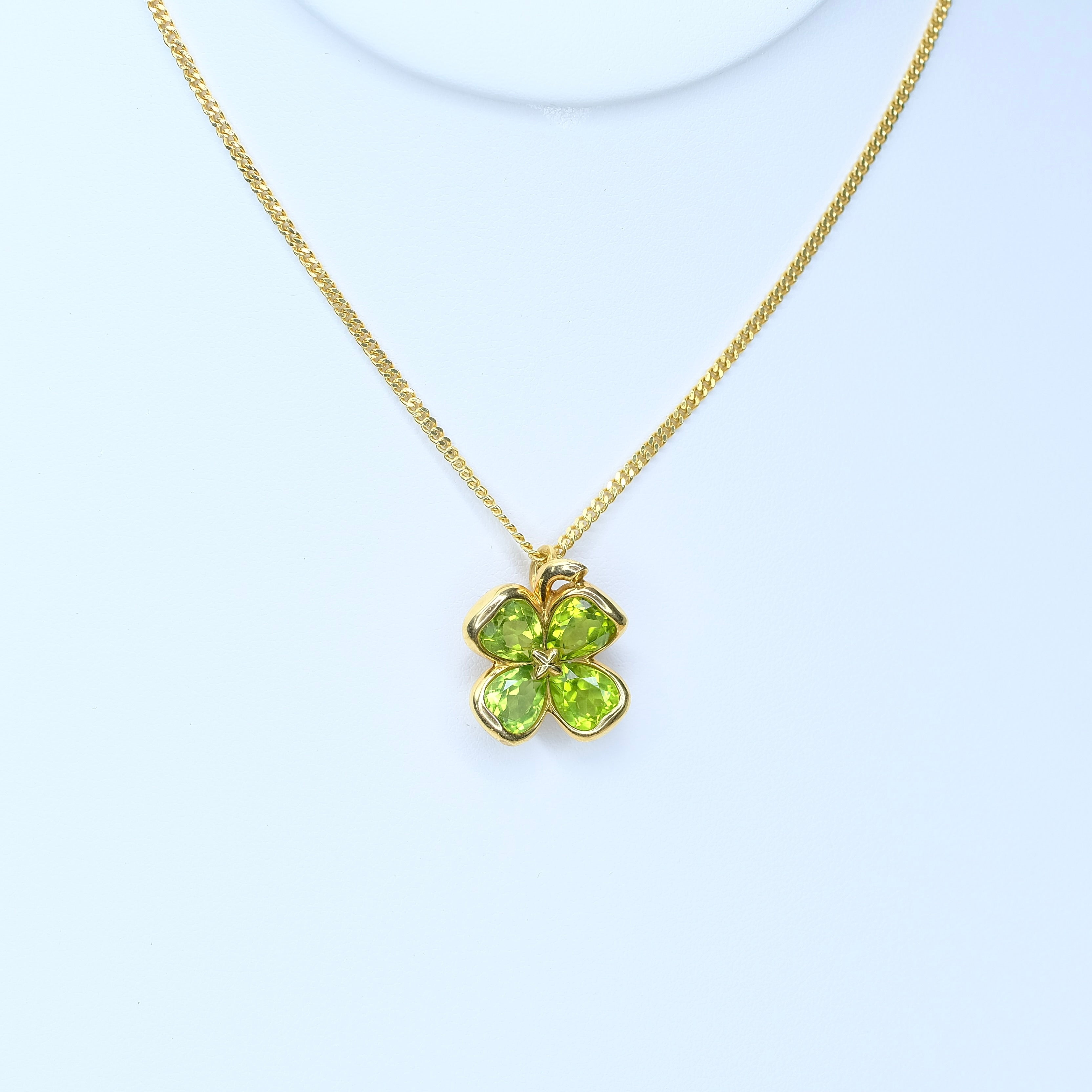 CHANEL 18K YELLOW GOLD PERIDOT CLOVER PENDANT CUBAN CHAIN - Luxuriant Concierge