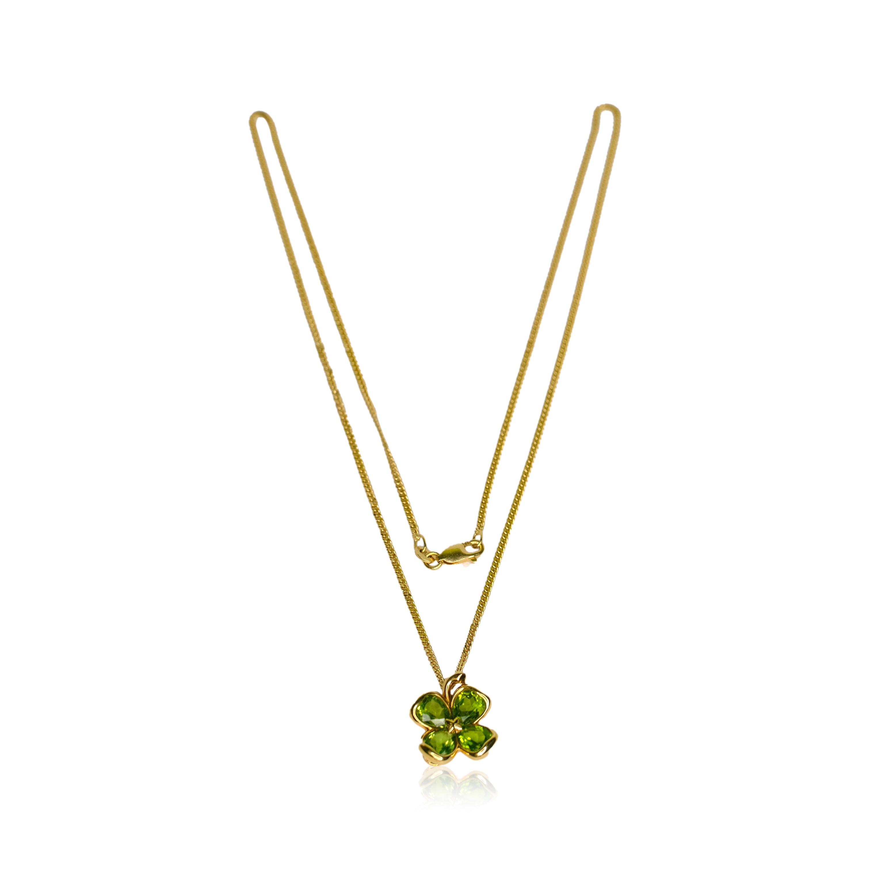 CHANEL 18K YELLOW GOLD PERIDOT CLOVER PENDANT CUBAN CHAIN - Luxuriant Concierge