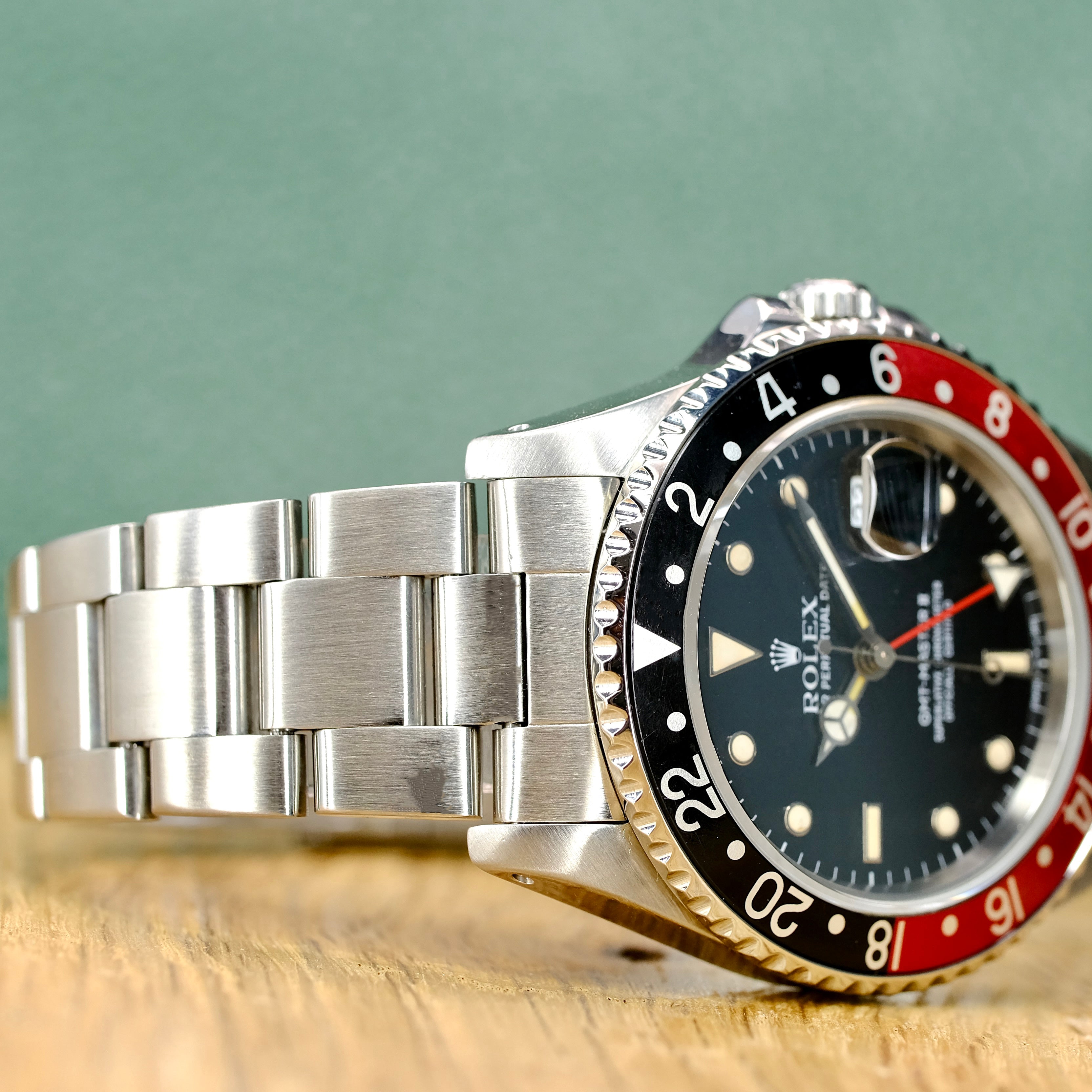 Rolex GMT-Master II Black Dial "COKE" Oyster Band 16710 - Luxuriant Concierge