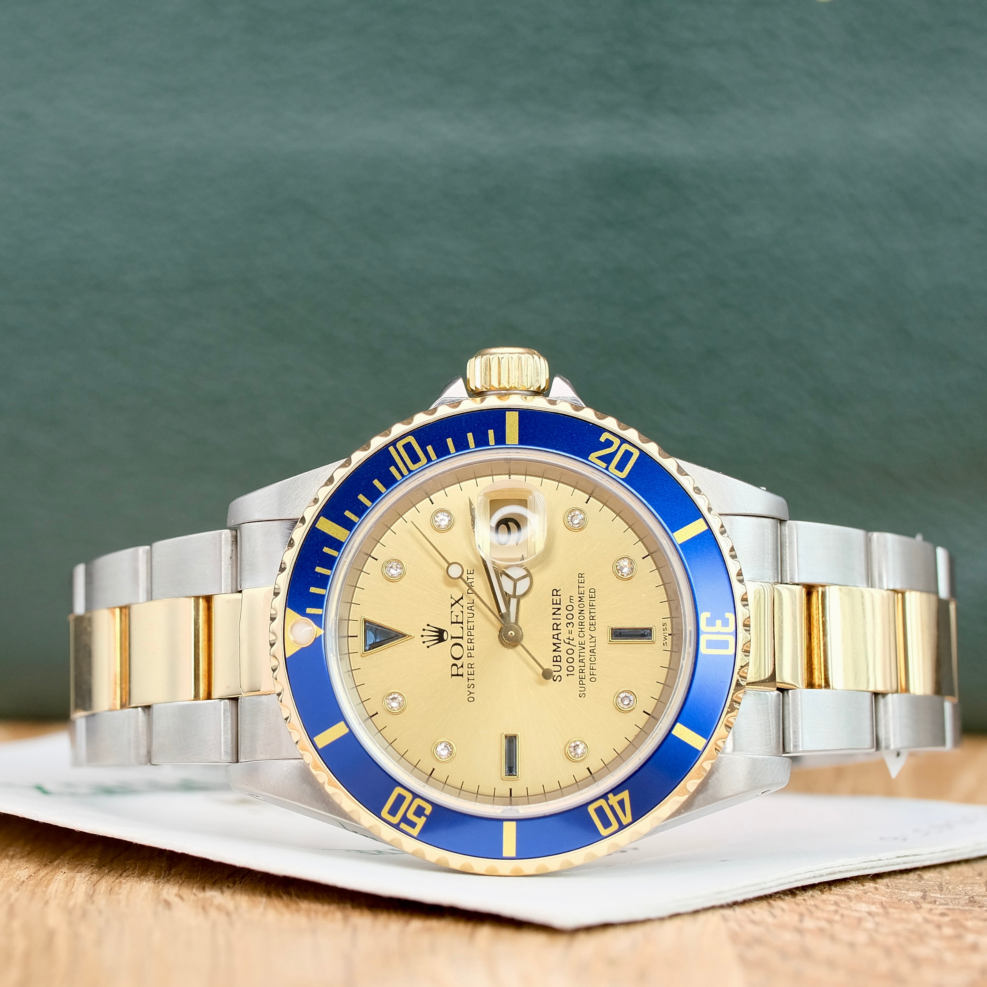 Rolex Submariner Champagne Serti Dial Oyster Band 16613 w Box & Paper - Luxuriant Concierge