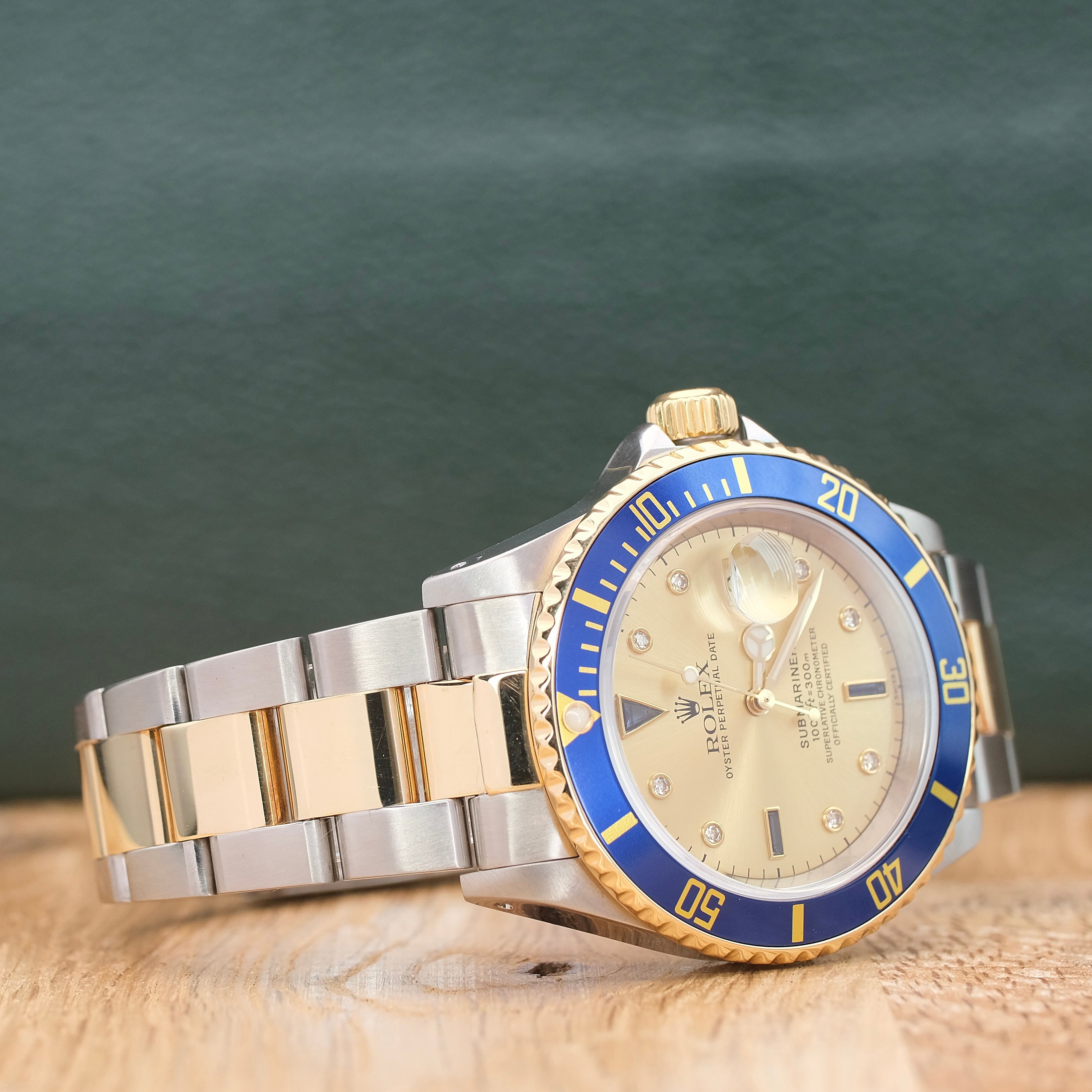 Rolex Submariner Champagne Serti Dial Oyster Band 16613 w Box & Paper - Luxuriant Concierge