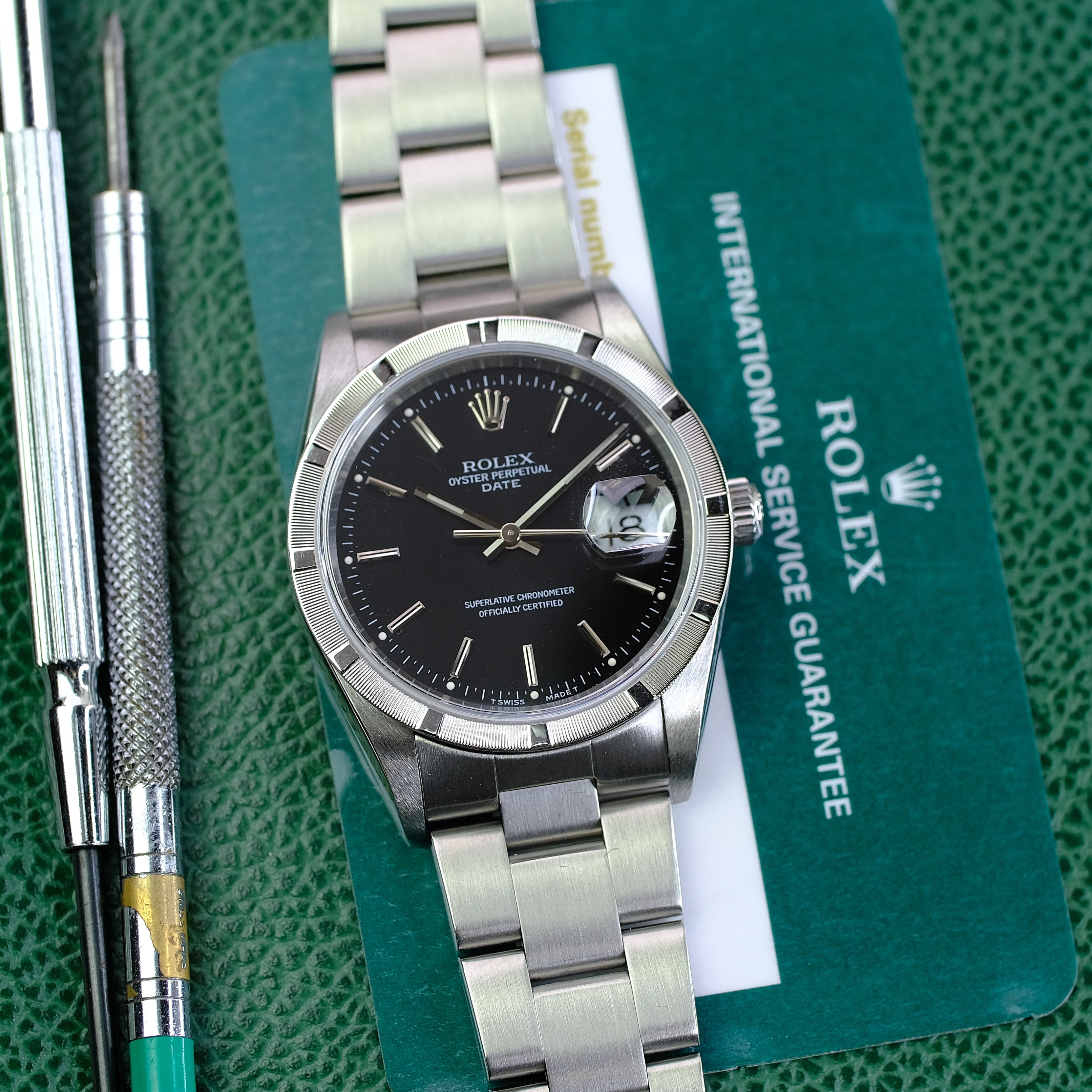 Box & Paper Rolex Date 15210 Black Dial 36mm Stainless Steel Engine-turned Bezel Oyster Band