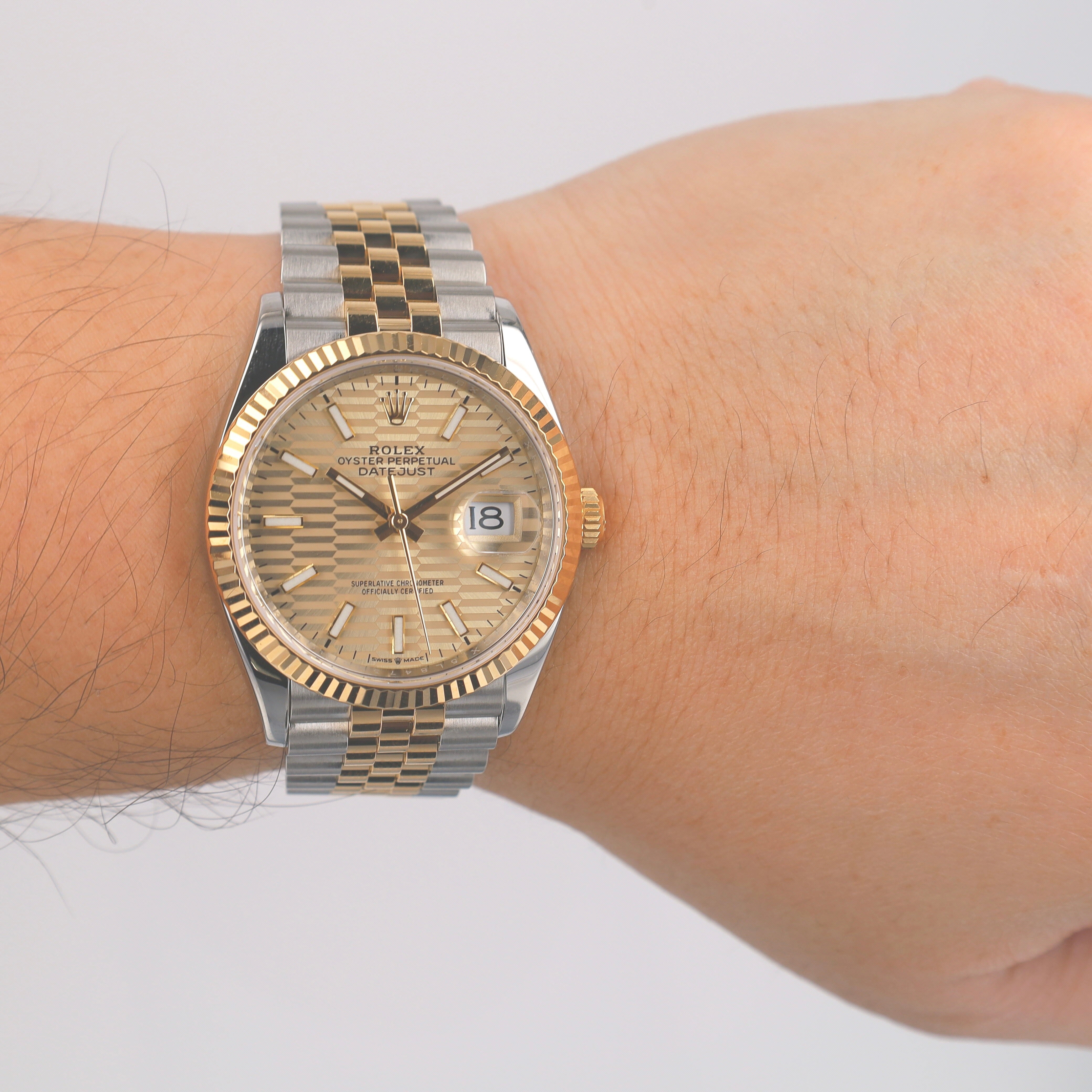 Rolex Datejust 126233 Two-Tone Champagne Motif Index Dial Fluted 36mm Mens Watch - Luxuriant Concierge