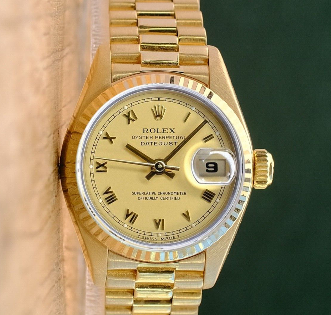 ROLEX DATEJUST CHAMPAGNE ROMAN DIAL 18K YELLOW GOLD PRESIDENT 69178 - Luxuriant Concierge