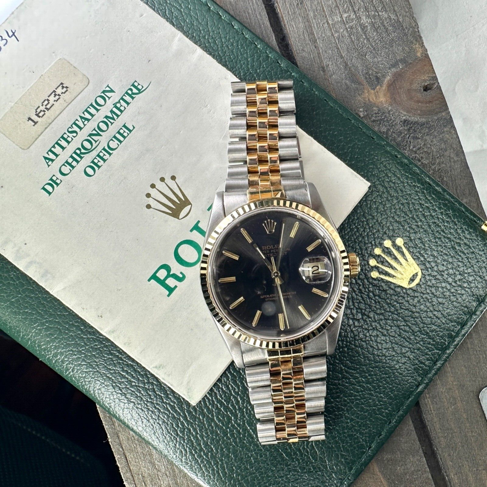 ROLEX DATEJUST RARE BLACK-GRAY INDEX DIAL 18K GOLD & STEEL JUBILEE 16233 - Luxuriant Concierge