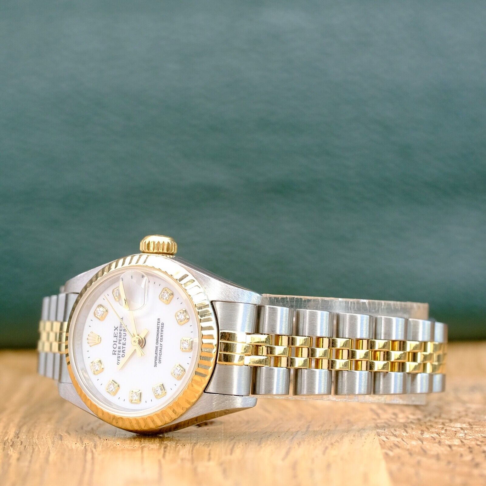 ROLEX DATEJUST WHITE ROMAN DIAL 18K GOLD & STEEL JUBILEE WATCH 69173 - Luxuriant Concierge