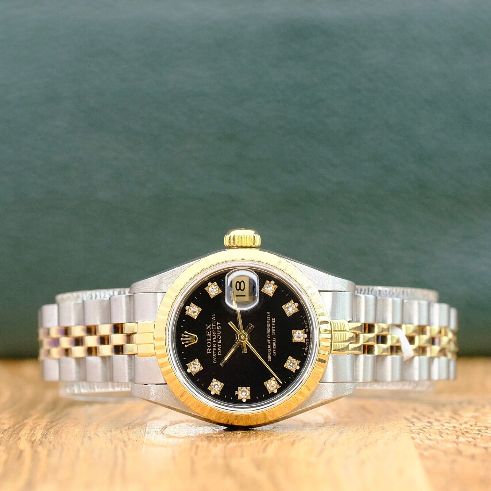 ROLEX DATEJUST BLACK DIAMOND DIAL 18K GOLD & STEEL JUBILEE WATCH 69173 - Luxuriant Concierge