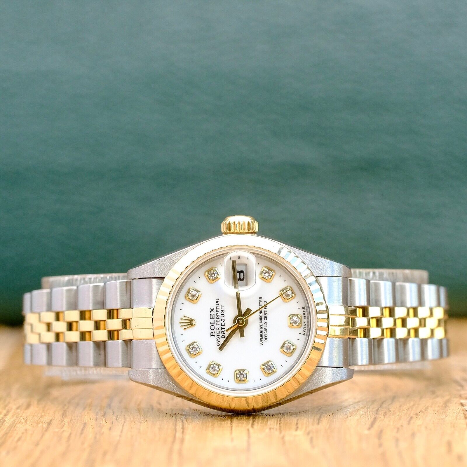 ROLEX DATEJUST WHITE ROMAN DIAL 18K GOLD & STEEL JUBILEE WATCH 69173 - Luxuriant Concierge