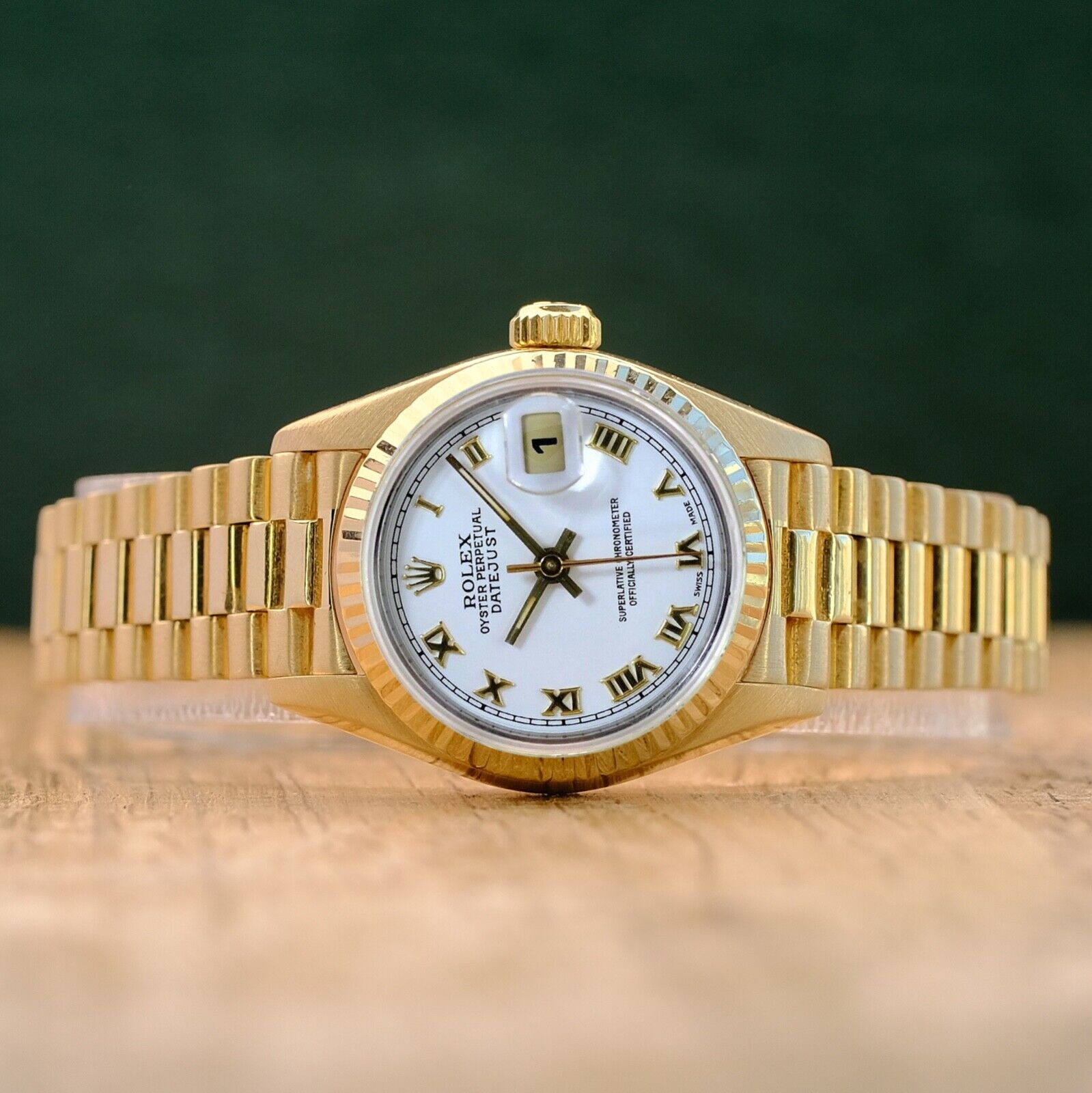 ROLEX DATEJUST WHITE ROMAN DIAL 18K YELLOW GOLD PRESIDENT 69178 - Luxuriant Concierge