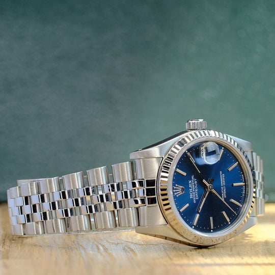 ROLEX OYSTERL PERPETUAL BLUE INDEX DIAL STEEL JUBILEE WATCH 68274 - Luxuriant Concierge