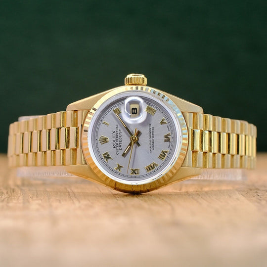 ROLEX DATEJUST GRAY ROMAN DIAL 18K YELLOW GOLD PRESIDENT 69178 - Luxuriant Concierge