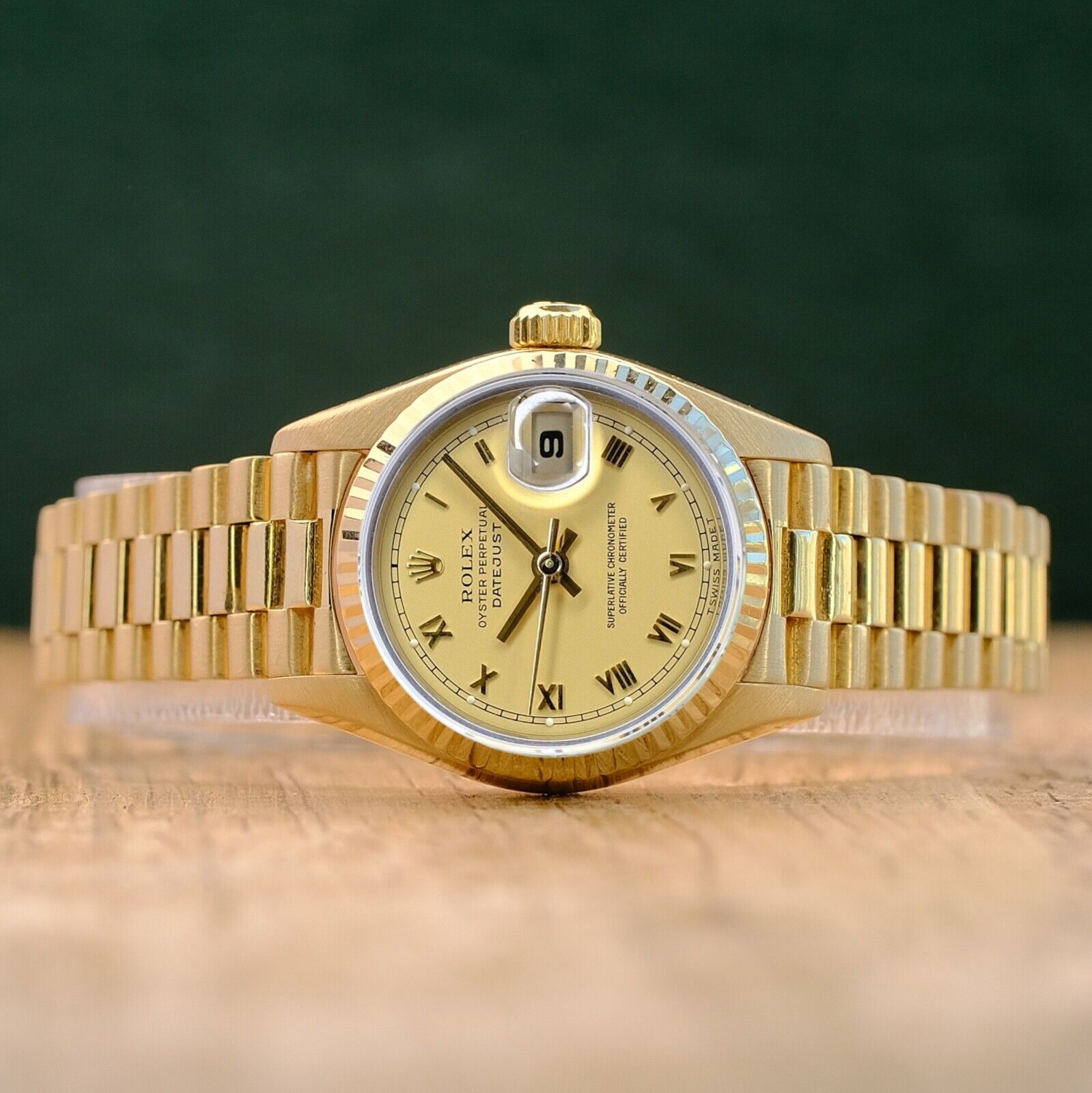 ROLEX DATEJUST CHAMPAGNE ROMAN DIAL 18K YELLOW GOLD PRESIDENT 69178 - Luxuriant Concierge