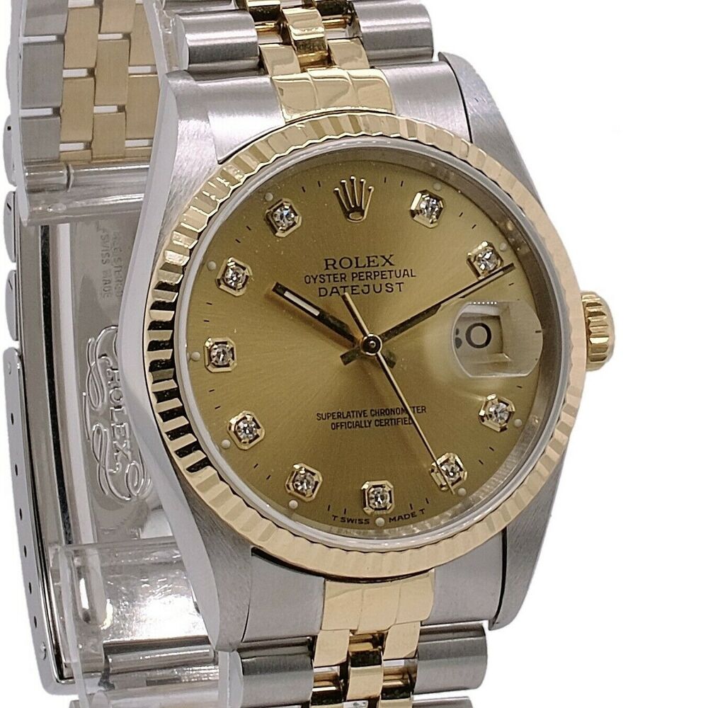 Rolex Datejust Champagne Diamond Dial Jubilee 68273 - luxuriantconcierge