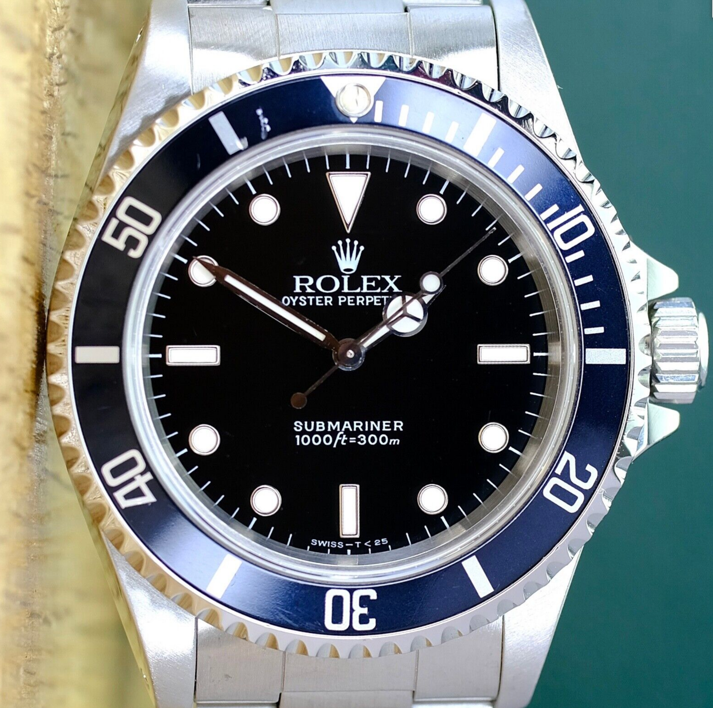 Rolex Mens Submariner Black No-Date 14060 Watch - luxuriantconcierge