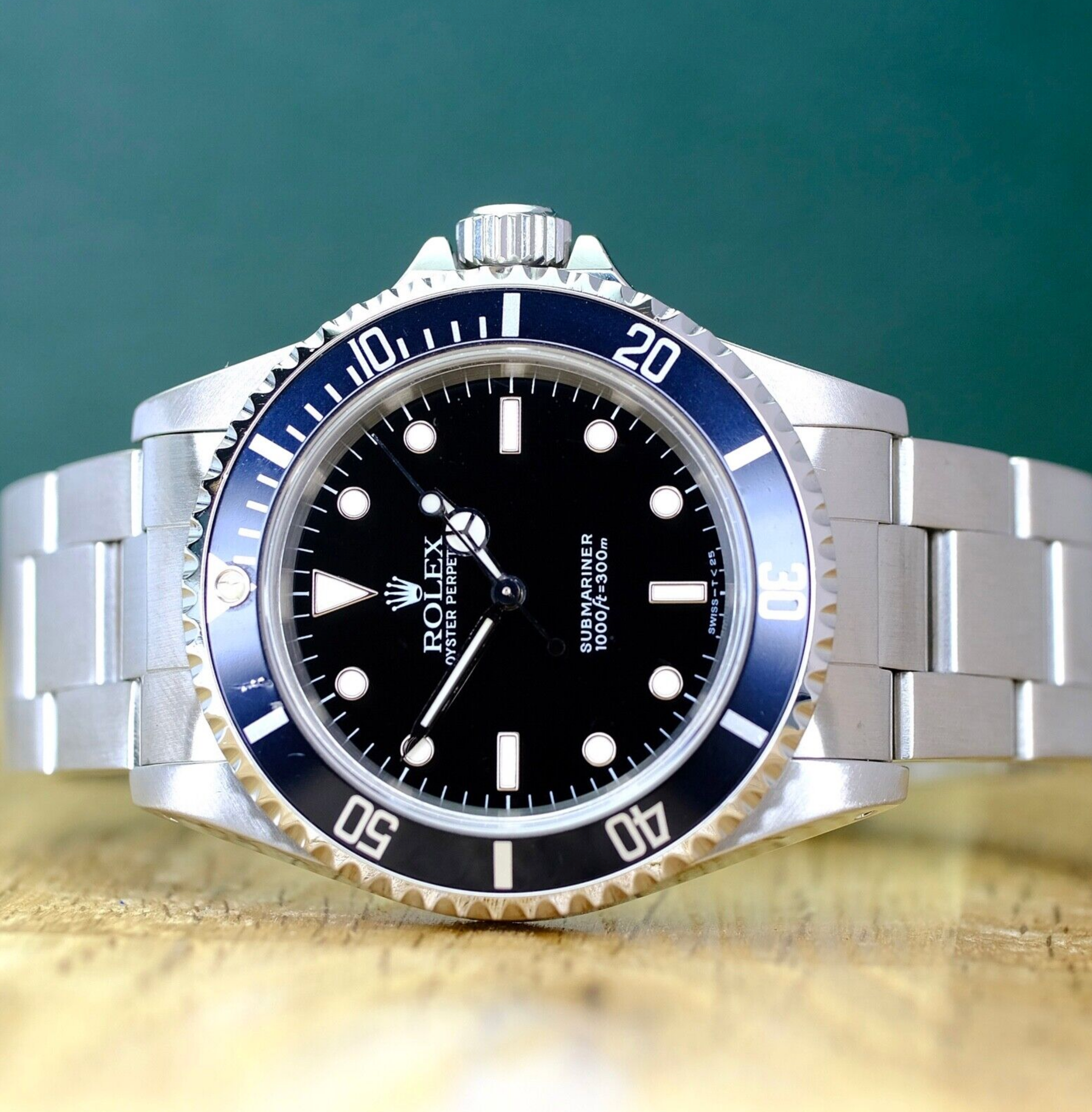 Rolex Mens Submariner Black No-Date 14060 Watch - luxuriantconcierge